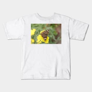 Junonia coenia butterfly, known as the common buckeye, on yellow flowers Kids T-Shirt